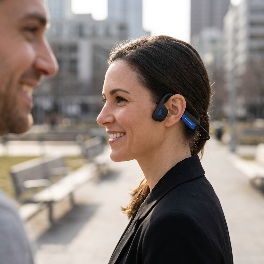 Woman in an urban park wearing Mezzo+ open-ear bone conduction headphones while smiling at neighbor.